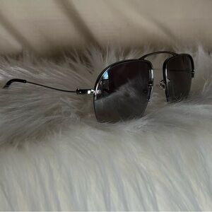Prada Silver Aviator Sunglasses with Gray Lenses